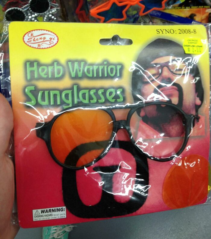 Off-brand Halloween costume accessory packaging for Herb Warrior Sunglasses with orange tint lenses and fake mustache.