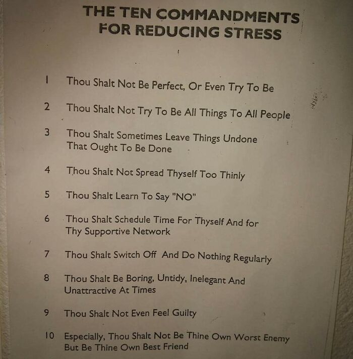 The ten commandments for reducing stress printed on a simple paper, promoting simple living and stress relief tips.