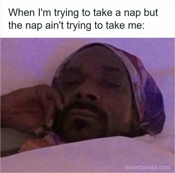 Man in bed wearing a headscarf looking frustrated, illustrating insomnia struggles in a funny insomnia meme.
