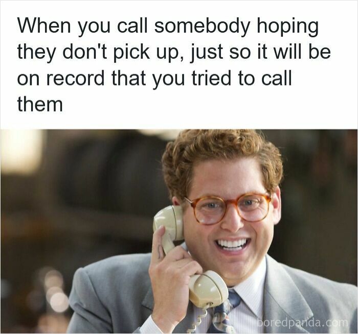 Man smiling on a phone call illustrating one of the specific moments in our lives that aren’t an original experience.