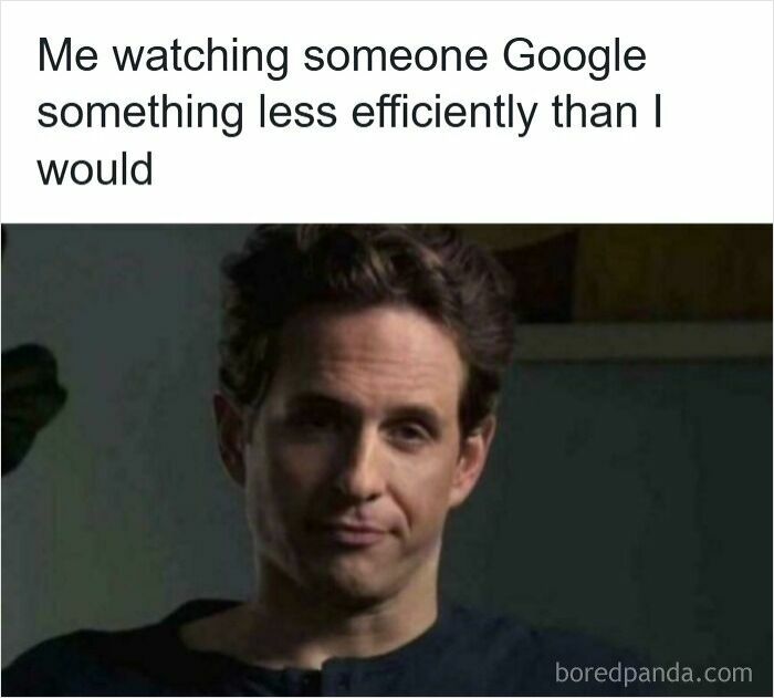 Man watching someone Google less efficiently, illustrating one of the specific moments in our lives not original.