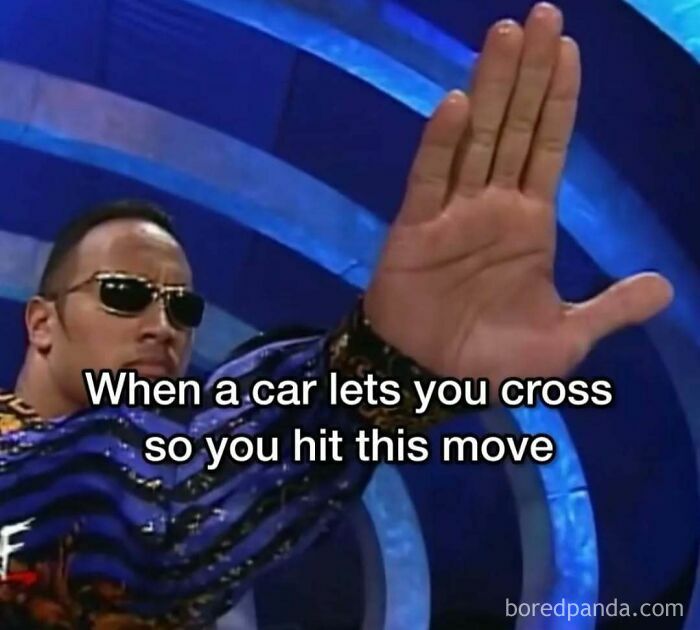 Man in sunglasses and patterned jacket making a hand gesture in a humorous driving meme about road rage.