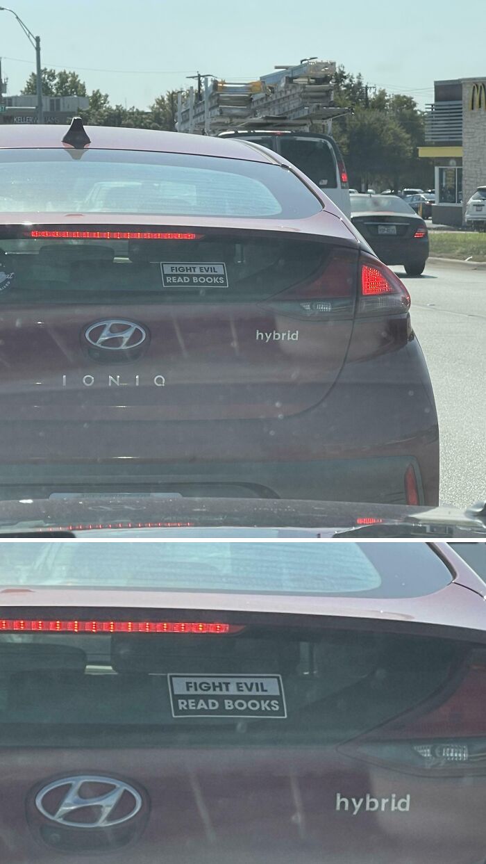 Rear view of a Hyundai hybrid car with a clever and hilarious bumper sticker that says fight evil read books.