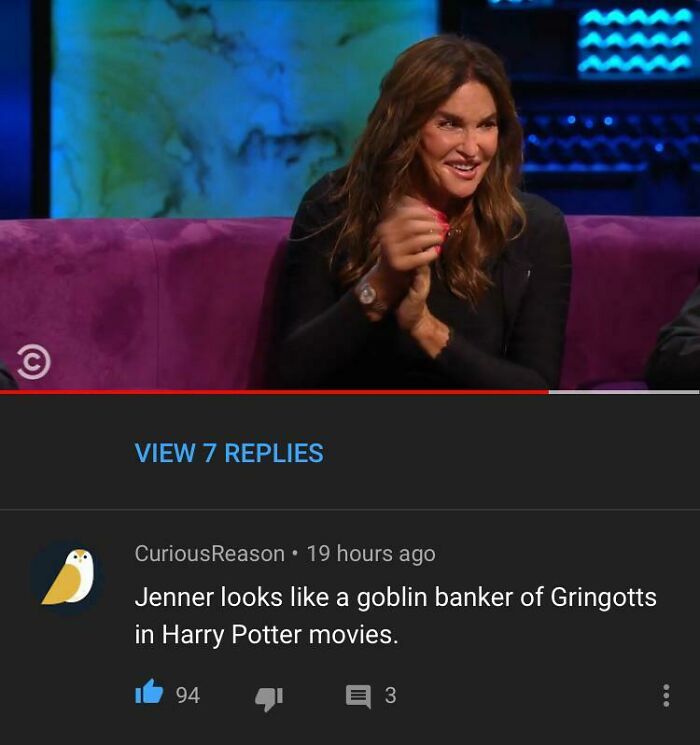 Woman smiling on a talk show with a hilarious YouTube comment about her as a goblin banker in Harry Potter movies.