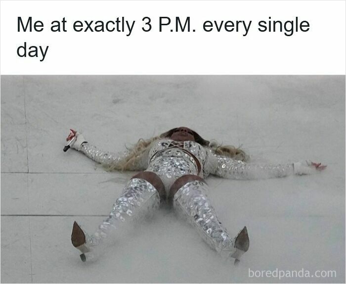 Performer lying on stage floor in shiny silver outfit with caption about feeling tired every day for teacher memes.