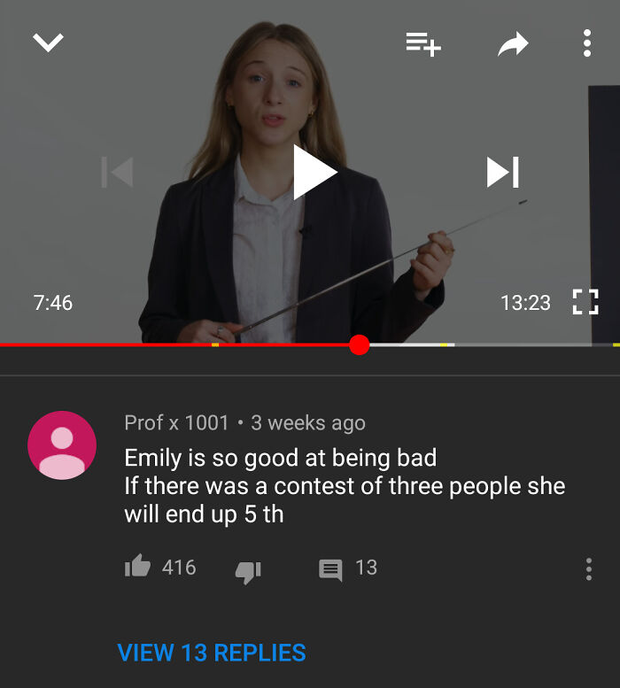 Young woman in a video paused at 7:46 with a humorous YouTube comment about Emily being bad in a contest.