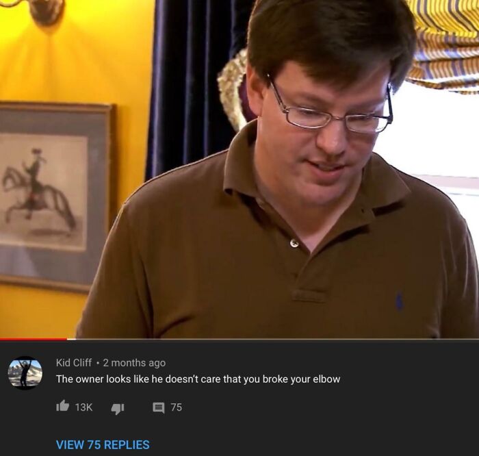 Man in glasses and brown shirt reading hilarious YouTube comments that are better than the video on a screen.