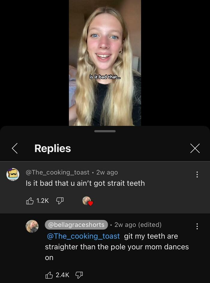 Young woman reacting to hilarious YouTube comments about teeth, showcasing funny replies better than the video itself.
