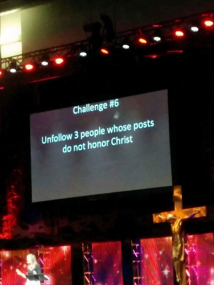 Church stage with a slide showing a challenge related to honoring Christ, highlighting the pleasures of the occult theme.