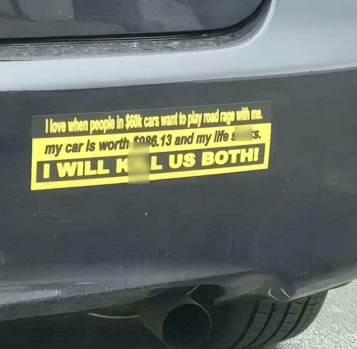 Yellow and black funny bumper sticker on a car, showcasing a clever and hilarious message snapped on the road.
