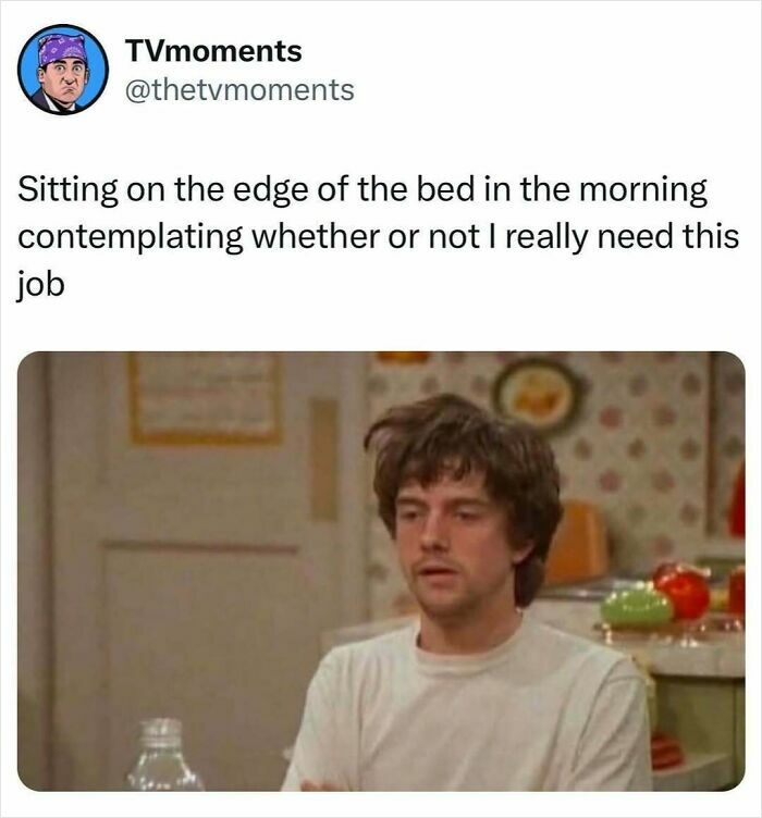 Man sitting at the edge of the bed in a kitchen with a tired expression, a relatable TV meme about morning thoughts.