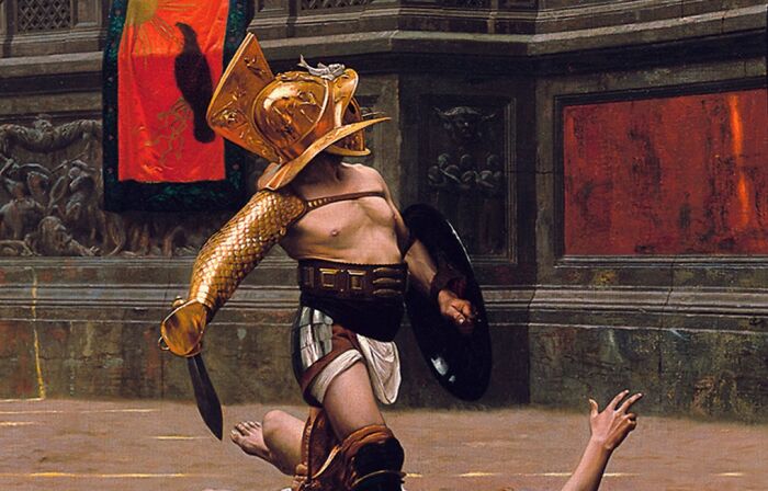 Gladiator in golden armor engaged in combat inside an ancient arena, illustrating dangerous historical sports.