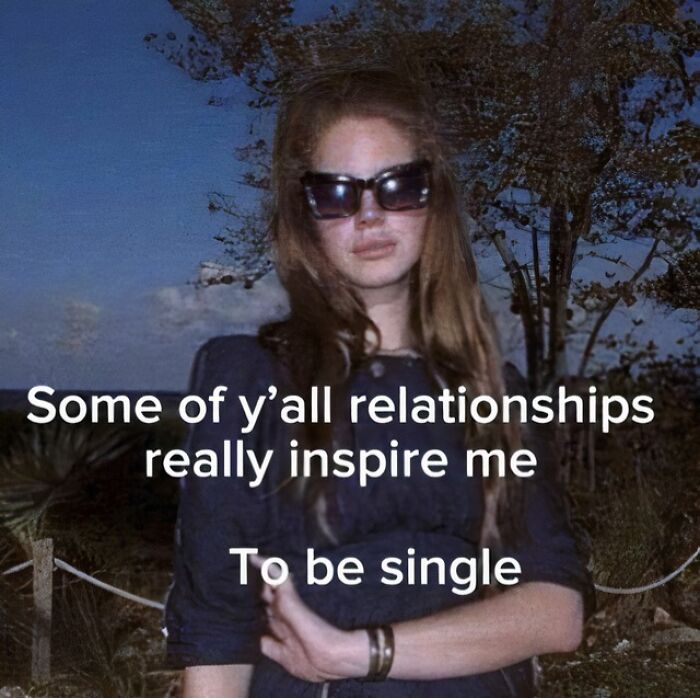 Woman wearing sunglasses and a black dress with a sarcastic meme about relationships, reflecting evil thoughts humor.