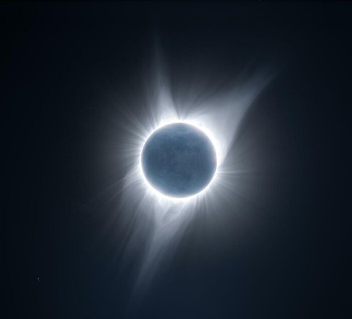 Solar eclipse captured in an epic astronomy photo showing the glowing corona and mysterious beauty of space at night.