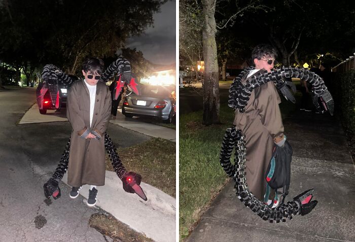 Child wearing an amazing kids Halloween costume with robotic spider legs and sunglasses outdoors at night