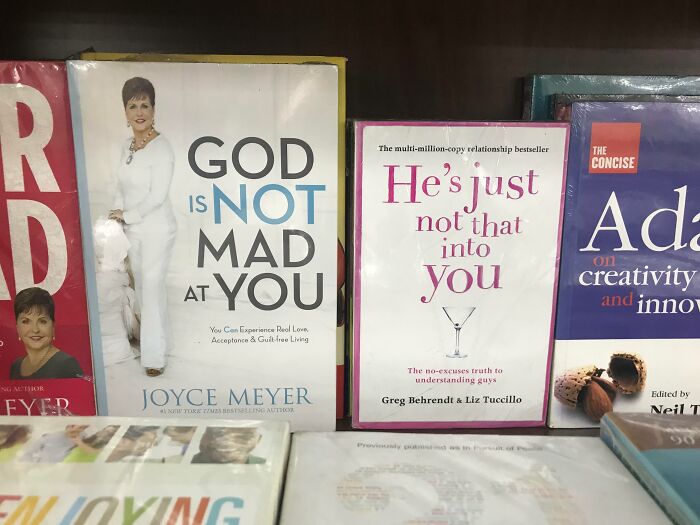 Books on a shelf with humorous book titles that could inspire hilarious meme-worthy posts and viral content.