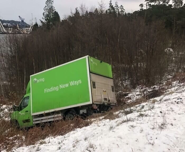 Delivery truck stuck on snowy hillside with caption Finding New Ways, a hilarious post turned instant meme.
