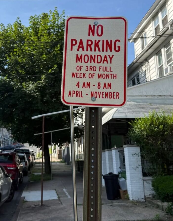 No parking road sign with confusing restrictions about specific Mondays and times, highlighting confusing road signs.