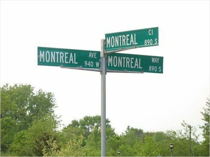 Confusing road signs showing multiple directions all labeled Montreal, causing navigation uncertainty.