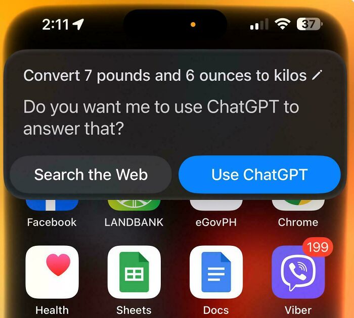Smartphone screen showing an assistant prompt offering to use ChatGPT for a pounds to kilos conversion, mildly infuriating moment.