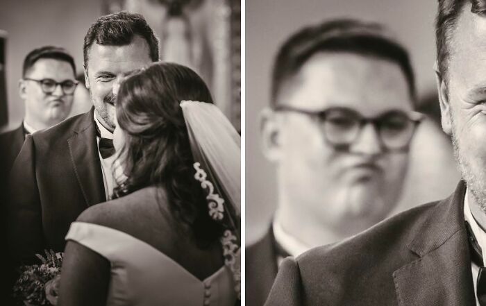 Man photobombs bride and groom's wedding photo with a humorous facial expression in a perfect photobomb moment.