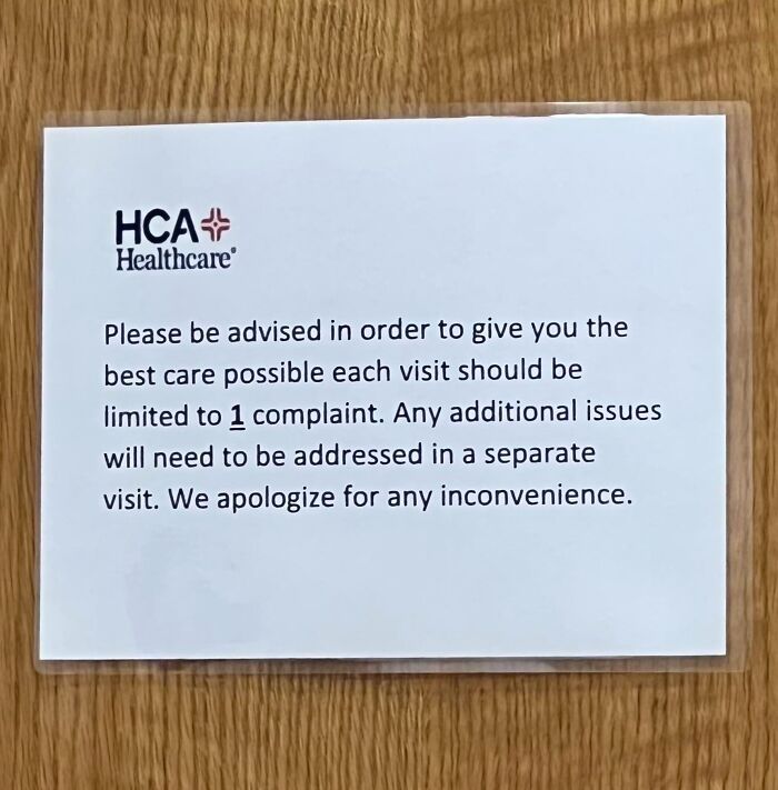 Notice from HCA Healthcare stating each patient visit is limited to one complaint, highlighting harsh realities of American healthcare.