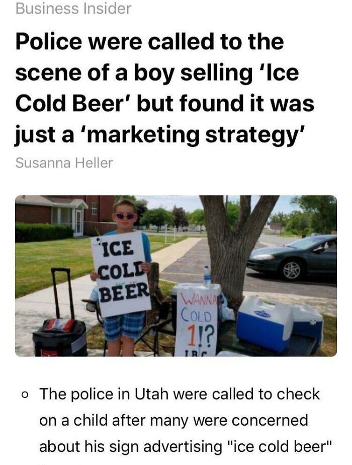 Boy holding sign saying ice cold beer as a clever marketing strategy, a funny example of kids outsmarting grown-ups outdoors.