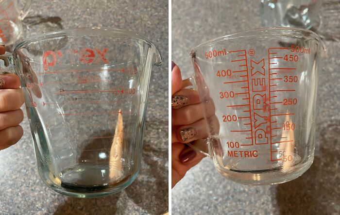 Close-up of two Pyrex measuring cups showing confusing or misleading measurement markings, mildly infuriating design.