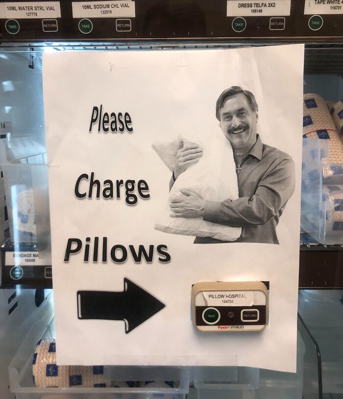 Sign on medical supply vending machine showing man holding pillow with text please charge pillows highlighting harsh realities of American healthcare.