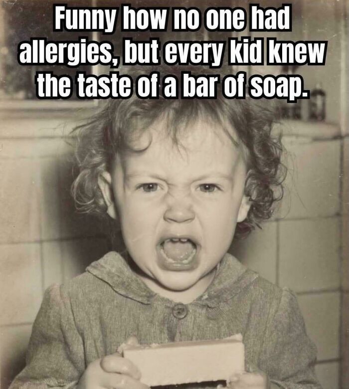 Child holding a bar of soap with angrily expressive face illustrating memes people share about childhood experiences.