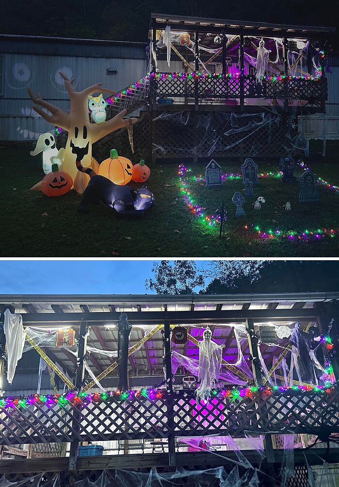 Outdoor Halloween decorations featuring inflatable pumpkins, ghost, spider web, tombstones, and colorful lights on a porch and lawn at night.