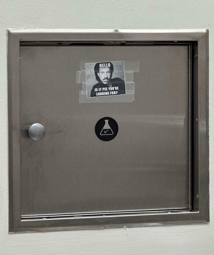 Sticker on a medical cabinet with a humorous doctor detail to put patients at ease in a clinical setting.