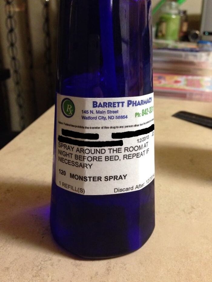 Blue bottle with a pharmacy label reading monster spray, part of hilarious and wholesome things doctors did to ease patients.
