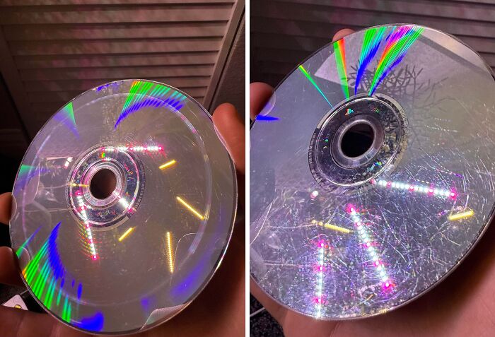 Scratched and damaged disc from careless online shopping mistake causing playback failure and frustration.