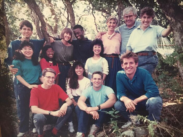 Group of friends posing outdoors in casual 1980s style, capturing the wild and wonderful spirit of the decade.
