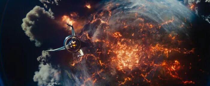 Spacecraft approaching a fiery, erupting planet surface highlighting bad movie details in confusing cinematic scenes.