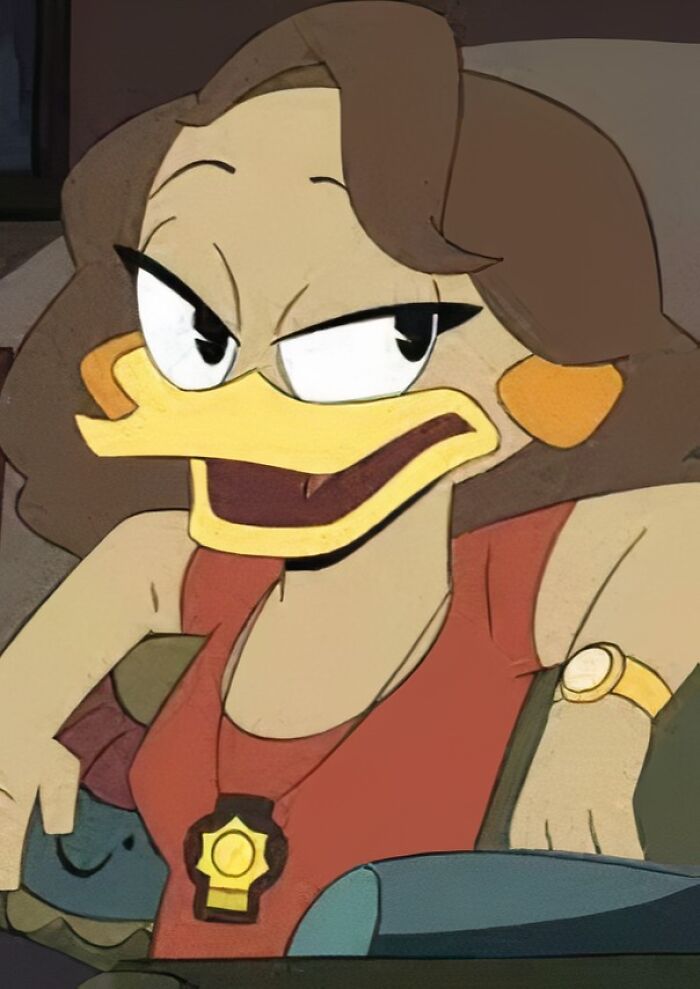 Animated female duck character with brown hair and red outfit, featured in a group focused on bad movie details.