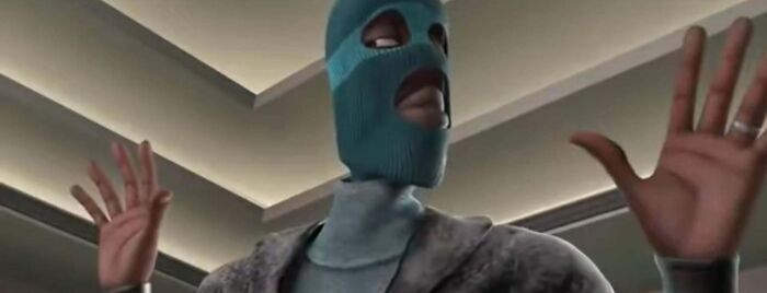 Man in blue ski mask with hands raised, a scene representing bad movie details from a confusing film moment.