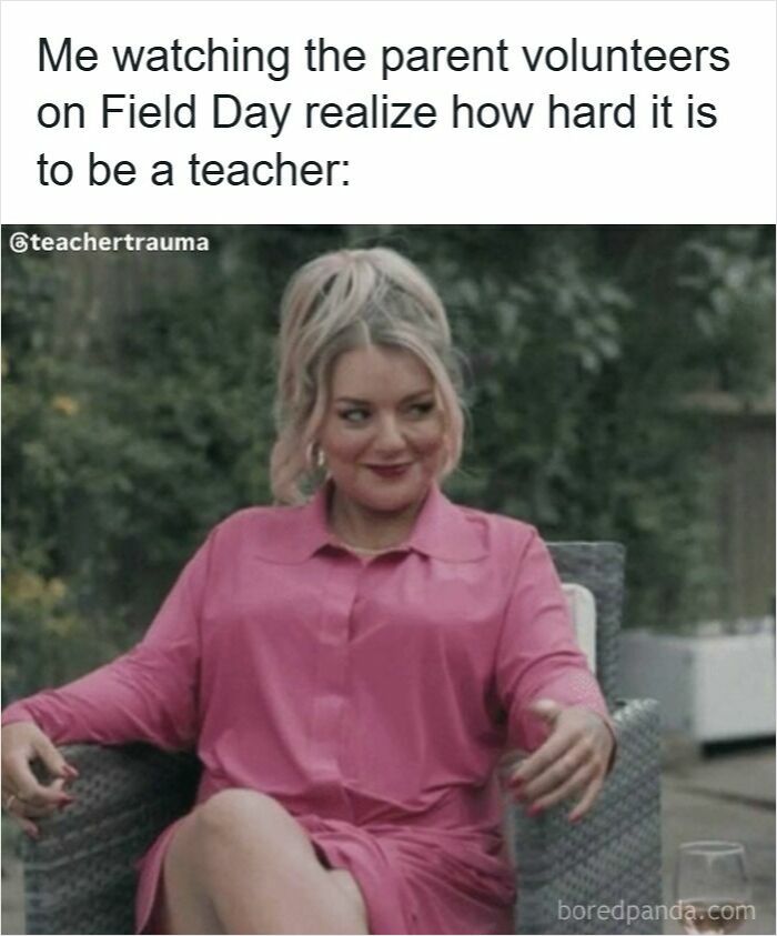 Woman in pink shirt smirking while sitting outside, relating to funny memes for teachers who deserve a raise and a nap.