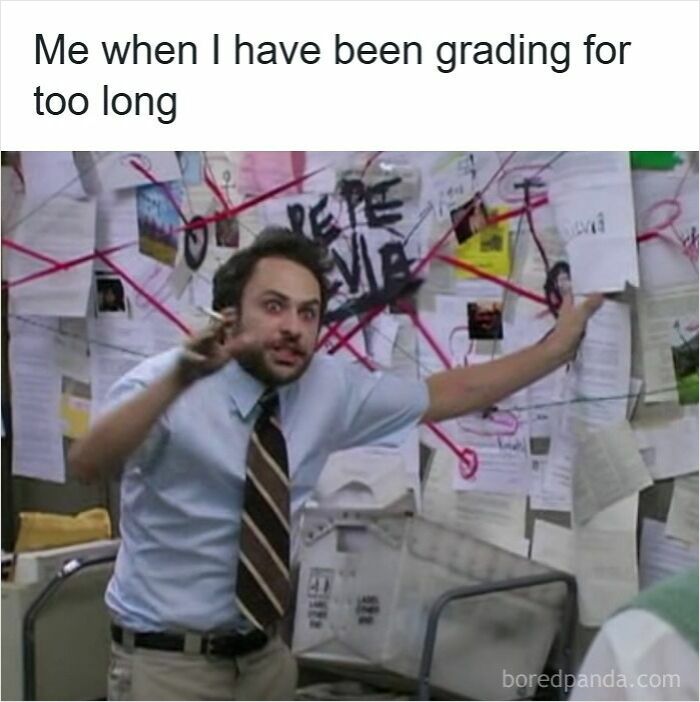 Teacher overwhelmed while grading papers with a chaotic wall of notes and red strings, illustrating funny memes for teachers.