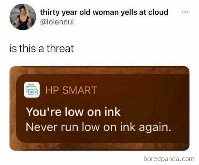 Humorous social media post showing accidental comedy in a printer warning about low ink as a possible threat.
