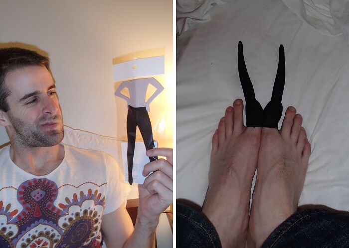 Man holding paper figure of legs and feet with paper legs placed between bare toes, showing Halloween fails humor.