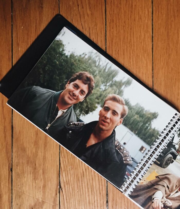 Photo book page showing two men in 1980s style jackets, capturing the wild and wonderful vibe of the 1980s.