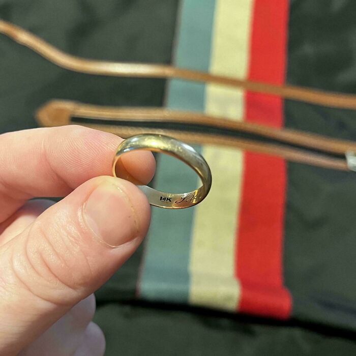Hand holding a 14K gold ring found in a thrift store, showcasing a lucky shopper’s thrift store jackpot discovery.