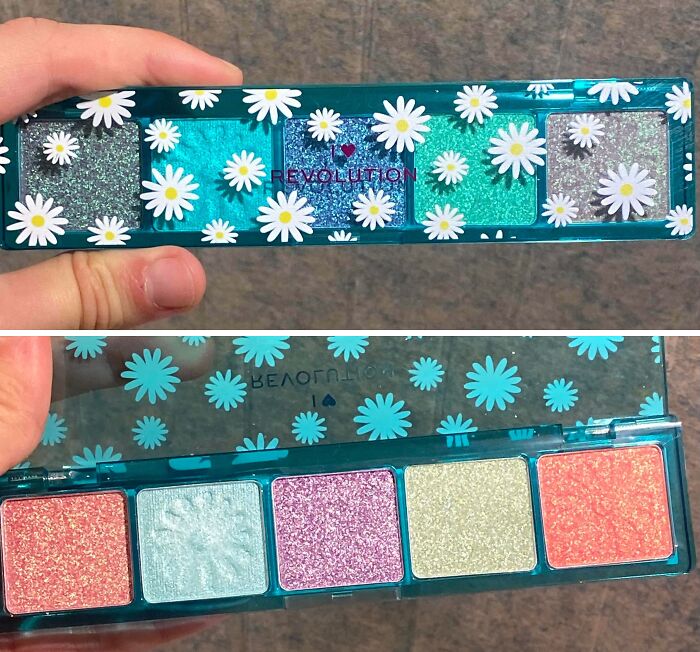 Glittery eyeshadow palette held in hand with daisy flower design, showcasing colorful makeup shades and Halloween fails theme.