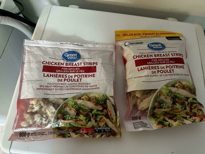 Packages of Great Value chicken breast strips on a counter, illustrating examples of sneakflation in food products.