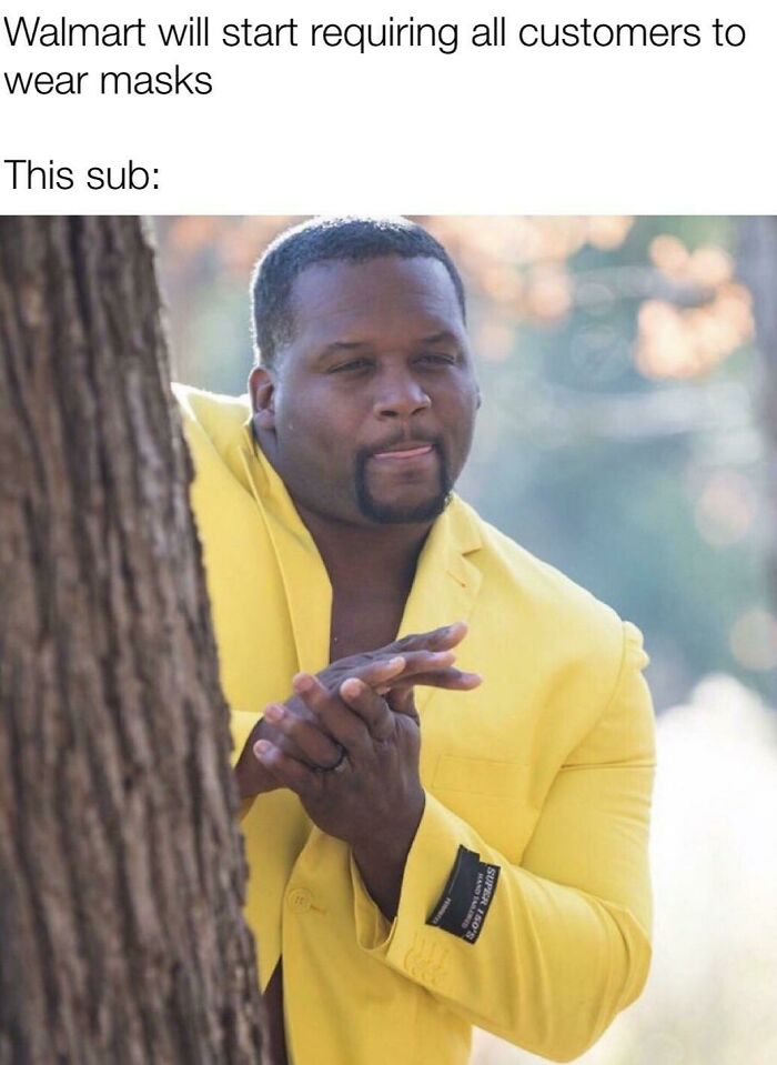 Man in a yellow jacket peeking from behind a tree, symbolizing excitement in People of Walmart humor content.