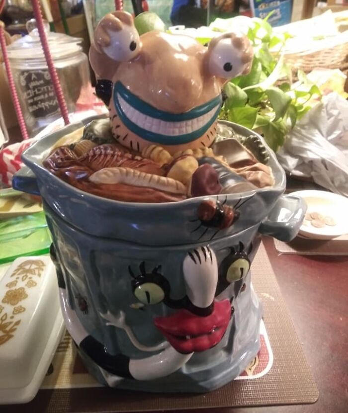 Unique thrift store ceramic container with a smiling frog lid and colorful details, a thrift store jackpot find.
