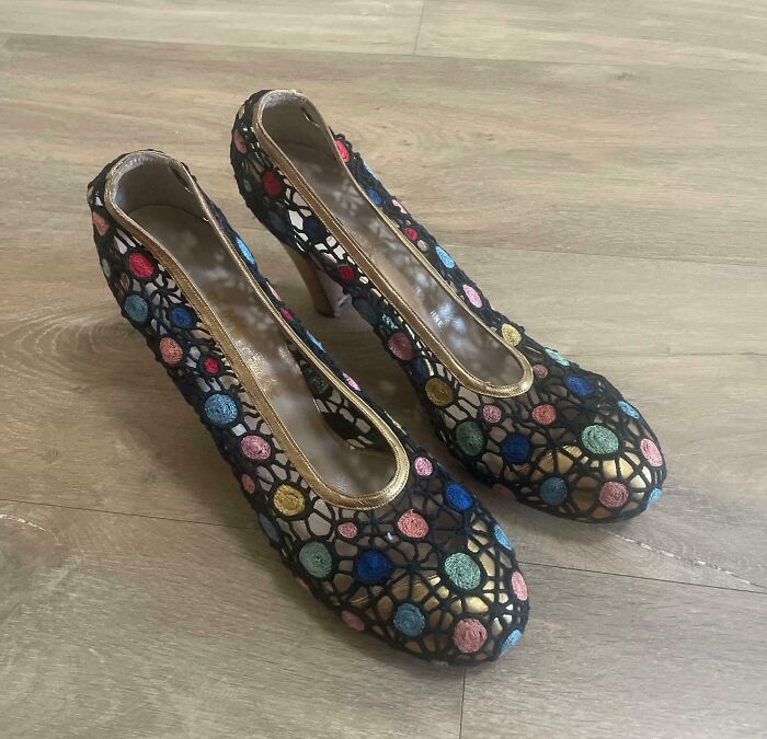 Pair of vintage high heels with colorful embroidered mesh design, a thrift store jackpot find by lucky shoppers.