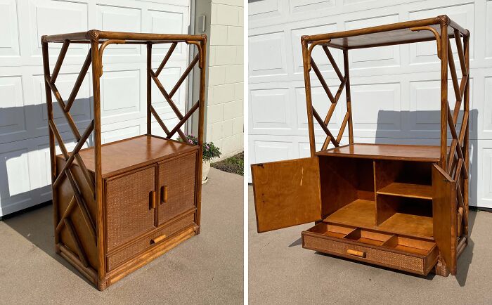 Vintage wooden thrift store cabinet with open doors and drawers, showcasing a rare lucky shopper find.